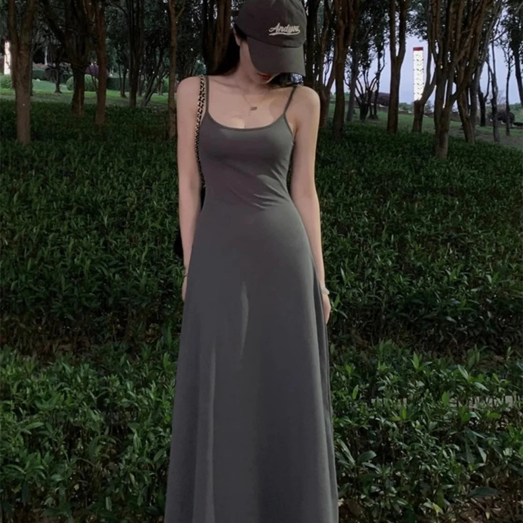 Sommer neue Mode, schlichtes Temperament, Spaghettiträger, langes, rückenfreies, schmal tailliertes, sexy, süßes, heißes Mädchen Freizeitkleid, Damenbekleidung