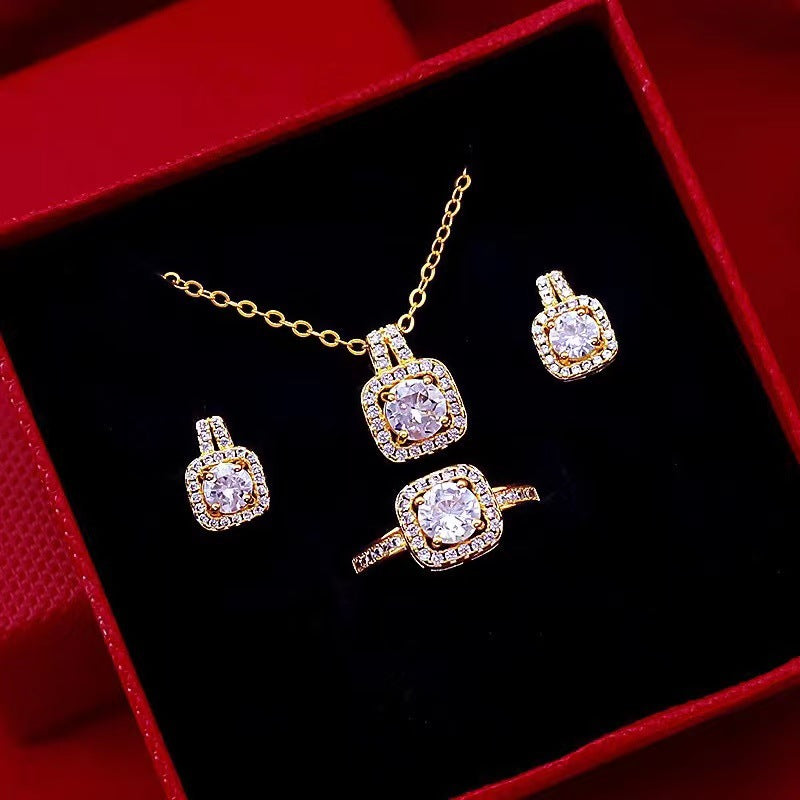 Fashion jewelry set: cubic zirconia pendant, choker necklace for women, gold-tone stud earrings, statement wedding ring