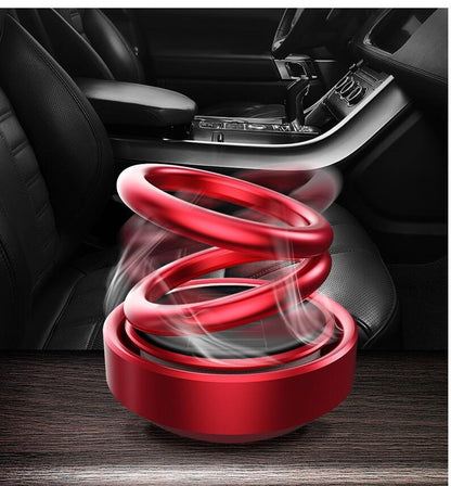 Solar-powered, rotating car air freshener with bench seat