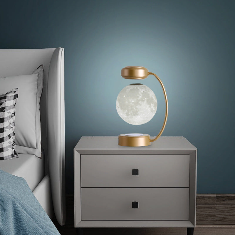 Wireless 3D LED moon night light with magnetic, floating and rotating sphere – ideal for school, office, bookstore and home.