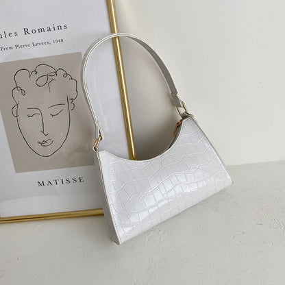 Kleine Schultertasche mit quadratischem Muster
