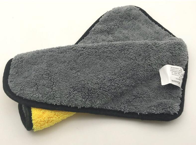 Two-tone, double-sided car wash cloth with dual functionality
