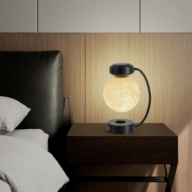 Wireless 3D LED moon night light with magnetic, floating and rotating sphere – ideal for school, office, bookstore and home.