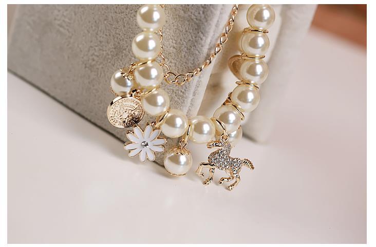 Perlenblumen Armband