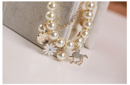 Perlenblumen Armband