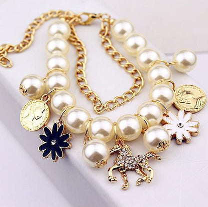 Perlenblumen Armband