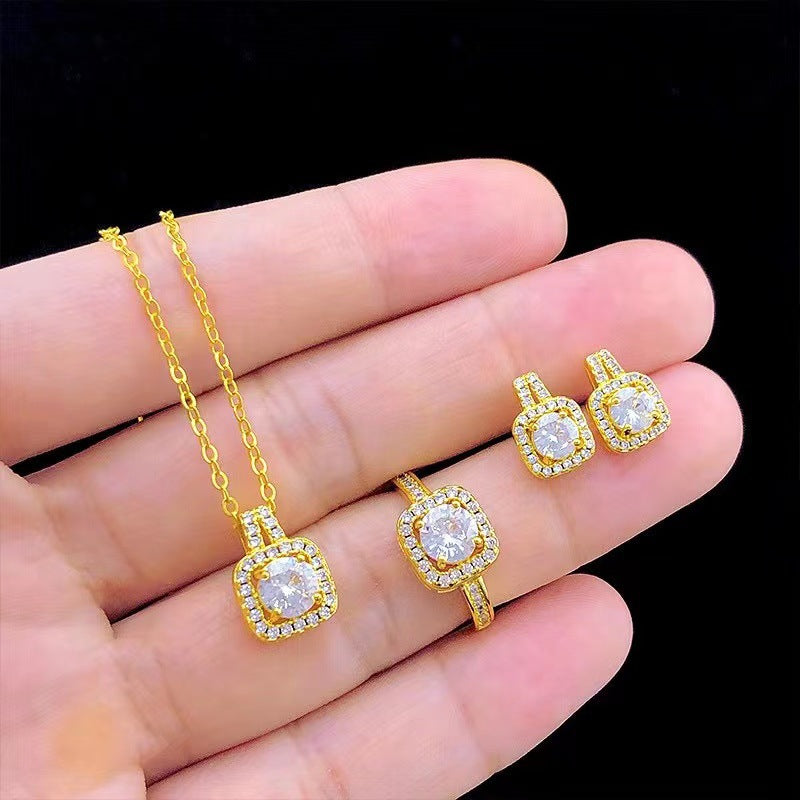 Fashion jewelry set: cubic zirconia pendant, choker necklace for women, gold-tone stud earrings, statement wedding ring