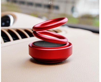 Solar-powered, rotating car air freshener with bench seat