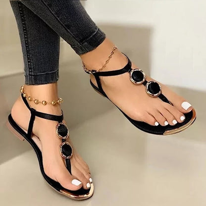 Modische flache Sandalen