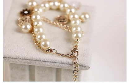 Perlenblumen Armband