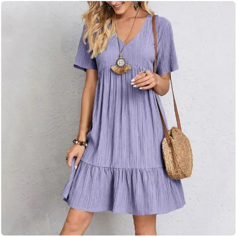 Damen Sommer Peplum Kleider Frühling V-Ausschnitt Kurzarm lockere Taille Rüschen A-Linie Urlaubs-Kleider