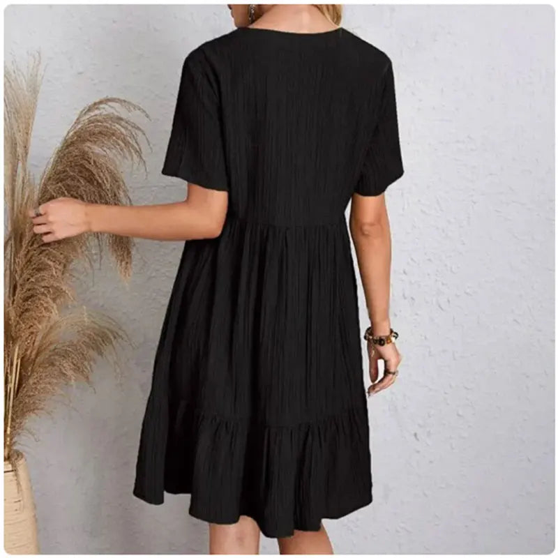 Damen Sommer Peplum Kleider Frühling V-Ausschnitt Kurzarm lockere Taille Rüschen A-Linie Urlaubs-Kleider