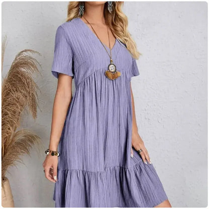 Damen Sommer Peplum Kleider Frühling V-Ausschnitt Kurzarm lockere Taille Rüschen A-Linie Urlaubs-Kleider