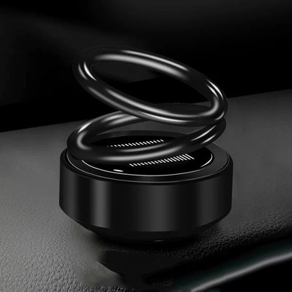 Solar-powered, rotating car air freshener with bench seat